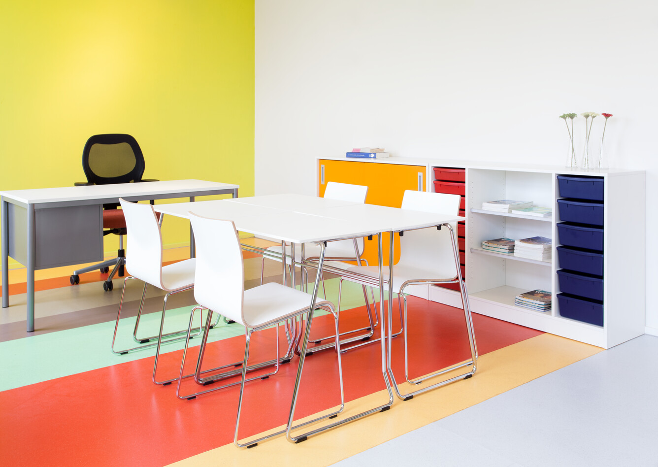 456,370 Royal Ahrend 456 seminar tables with chrome frame and white tops with 370 wireframe chairs in classroom front right view