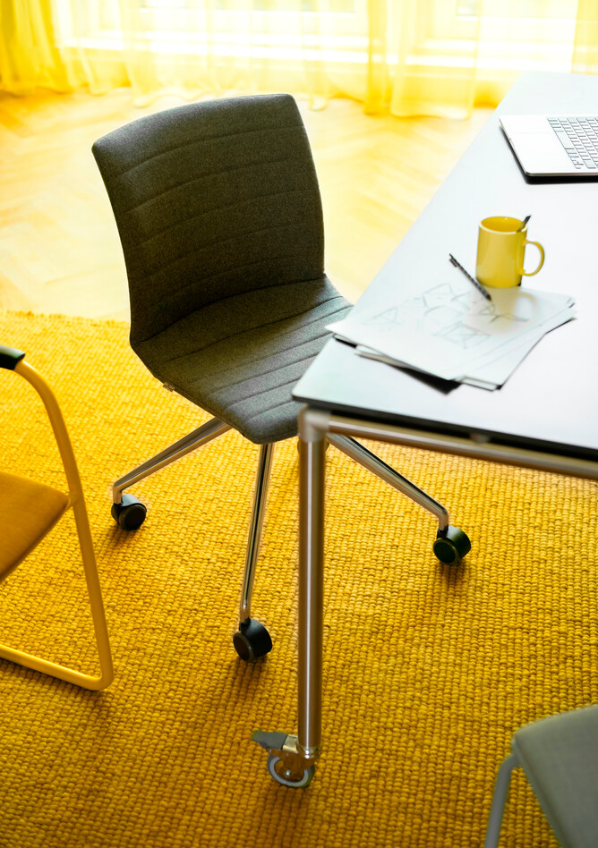 Well, Move Royal Ahrend Well chairs in yellow green and blue at Kvadrat store in Amsterdam L1000669