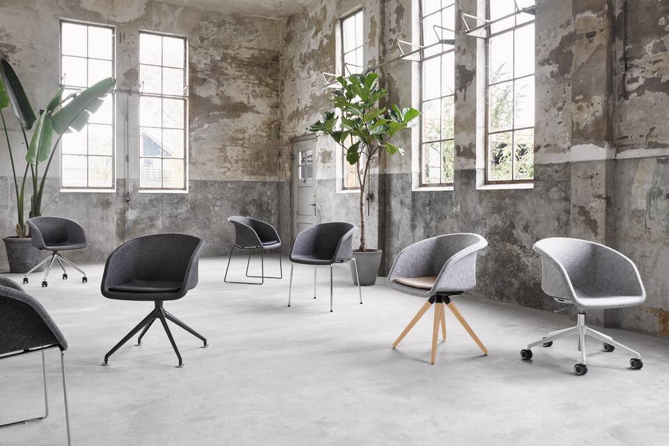 Well Armchair Ahrend Well felt armchairs with different frames in industrial setting