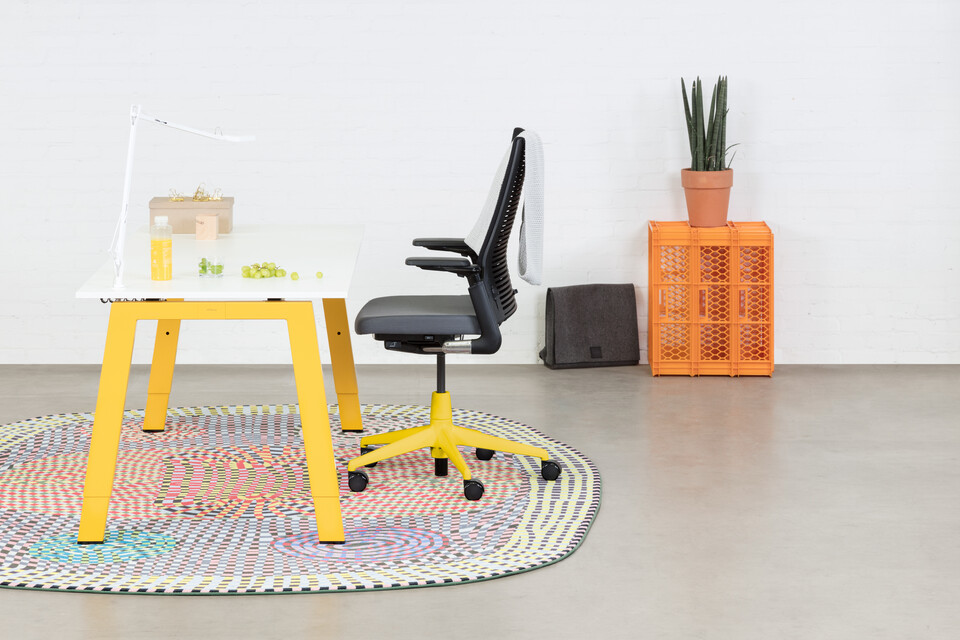 Balance, 2020 Extra Verta Royal Ahrend Balance 4 leg workstation in yellow with white top and grey 2020 office chair with yellow base left side view