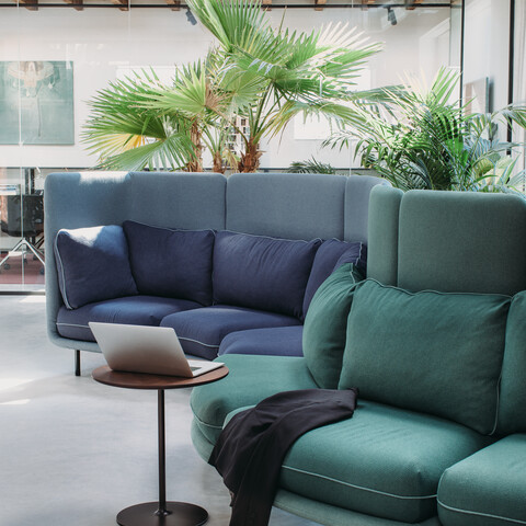 Embrace Royal Ahrend Embrace sofa upholstered in green and blue at HofmanDurjandin office in Diemen EB010