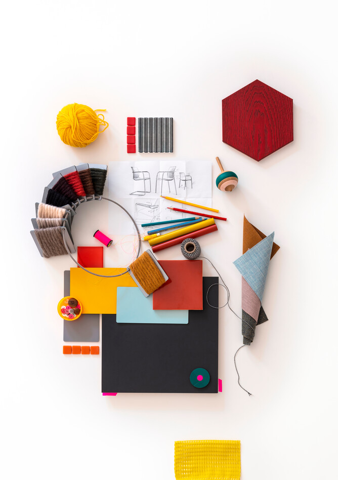 Well Royal Ahrend Well moodboard coral red and baby blue and golden yellow top view