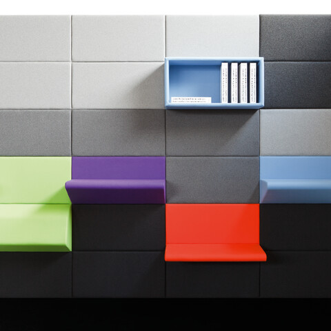 Living Wall Royal Ahrend Living Wall panels upholstered in grey with coloured seating and table panels front view