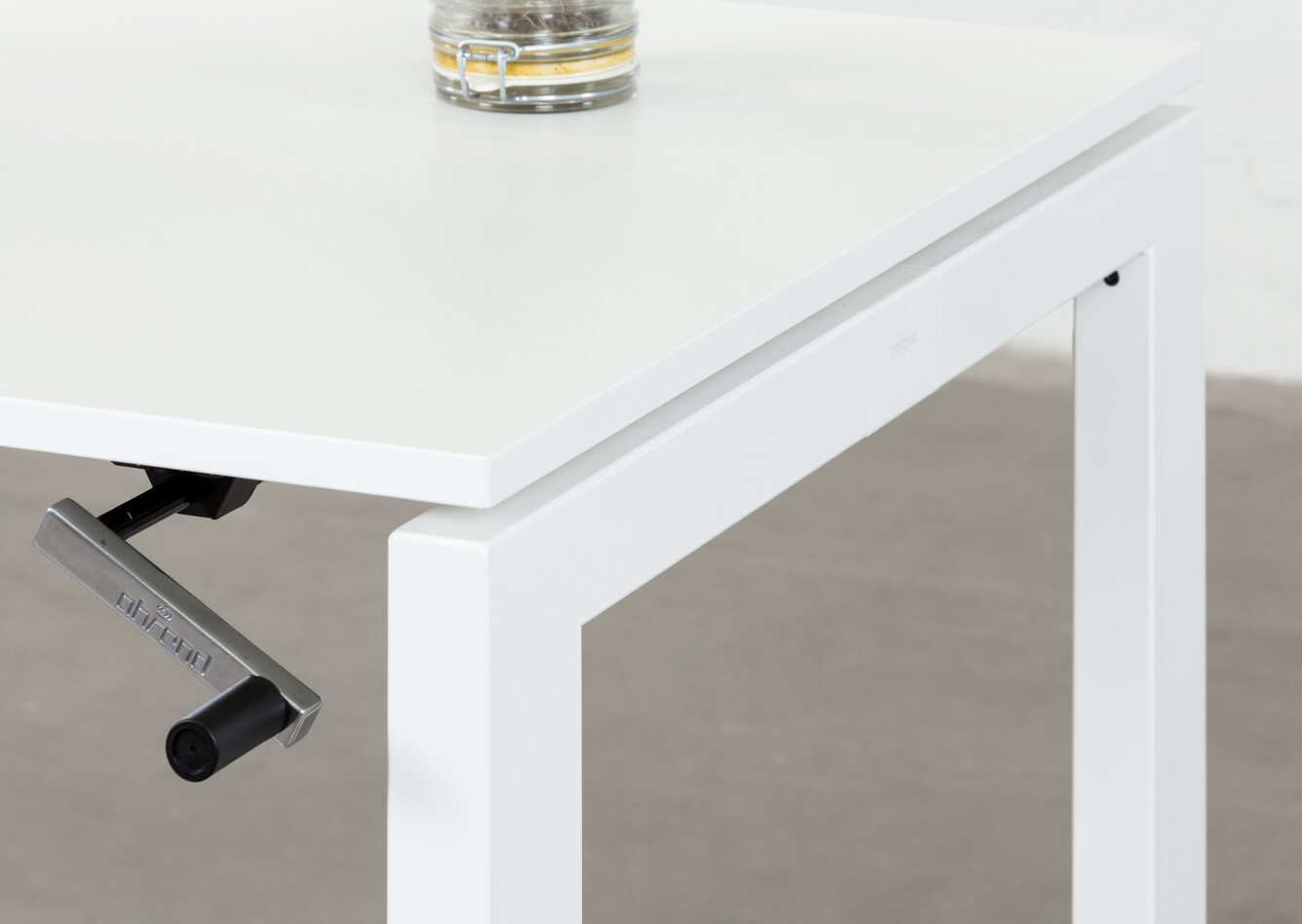 Balance Royal Ahrend Balance 4 leg in white with crank and glass jar with plant front right detail view