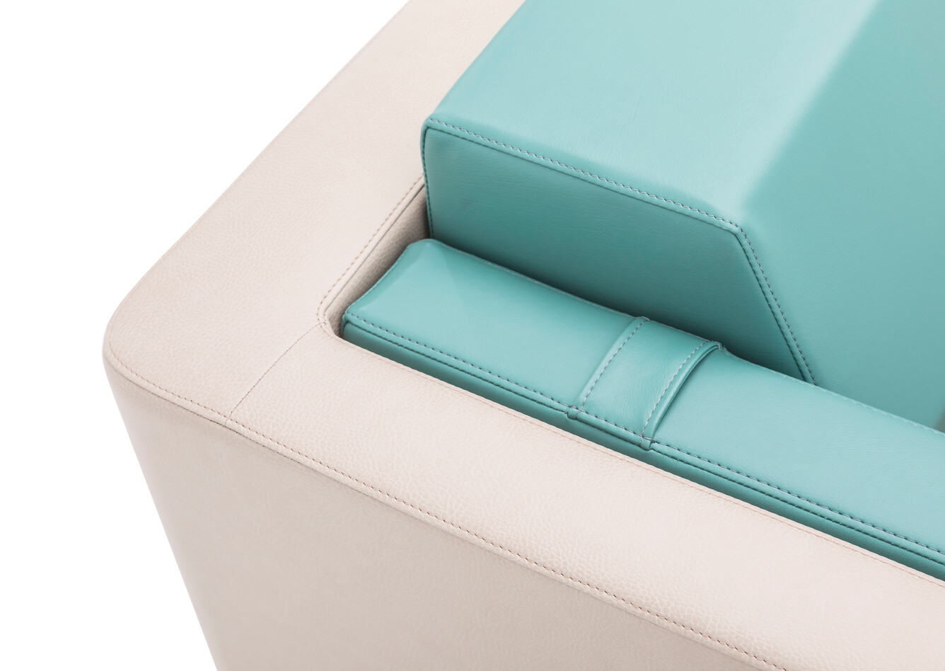 Rooming Royal Ahrend Rooming In sleeping armchair upholsterd in beige and turquoise rear left detail view