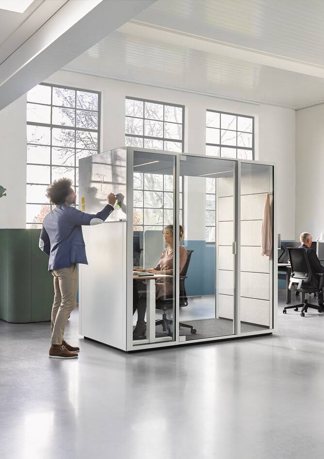 Qabin, Balance, Ease, Concentration Corner, Switch, ZINN Ahrend Switch and Zinn with Concentration Corner and Qabin with door closed and Balance with Ease desk and chair with models in a Hybrid working community setting