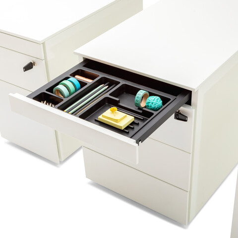Ladeblok / Pedestal Royal Ahrend Pedestals in white with open pen trays and turquoise office supplies front right detail view