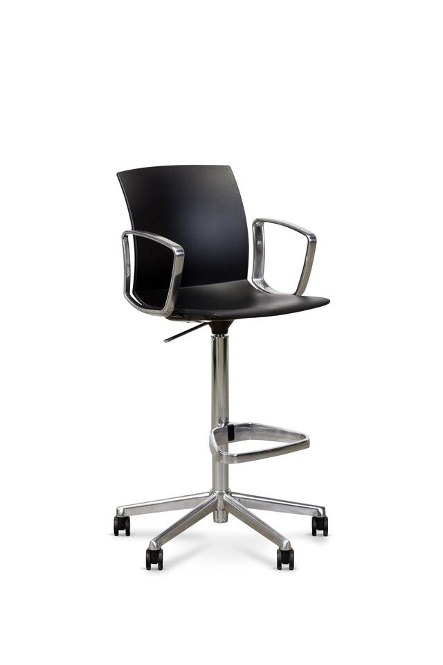 Well Work Royal Ahrend Well Work chair with circular black shell with polished frame and armrests front left view